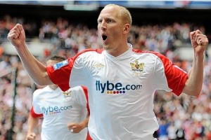 Edwards celebrates the winner at Wembley